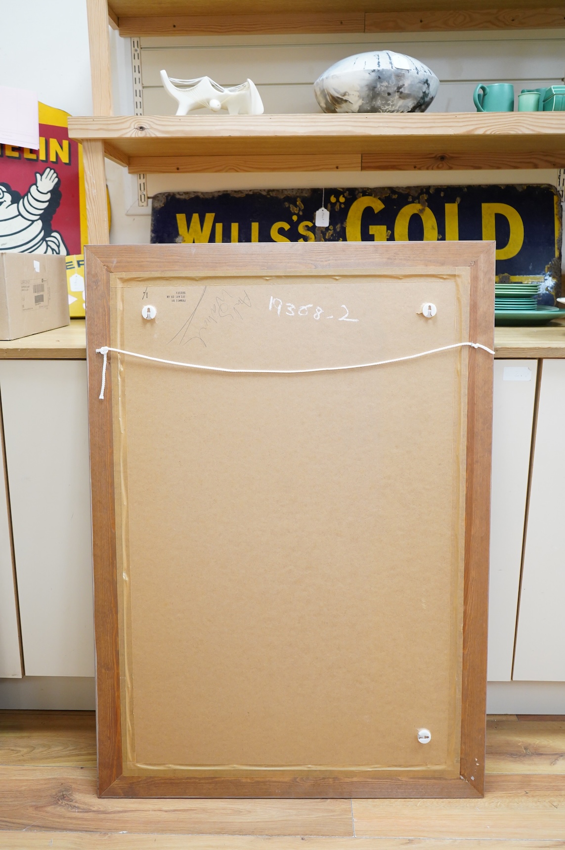 After Andy Warhol (American, 1928-1987), ‘Campbell's Soup Can’, Pop-art silkscreen print, details partially obscured by the frame, inscribed in pencil ‘Andy Warhol’ verso, 90 x 60cm